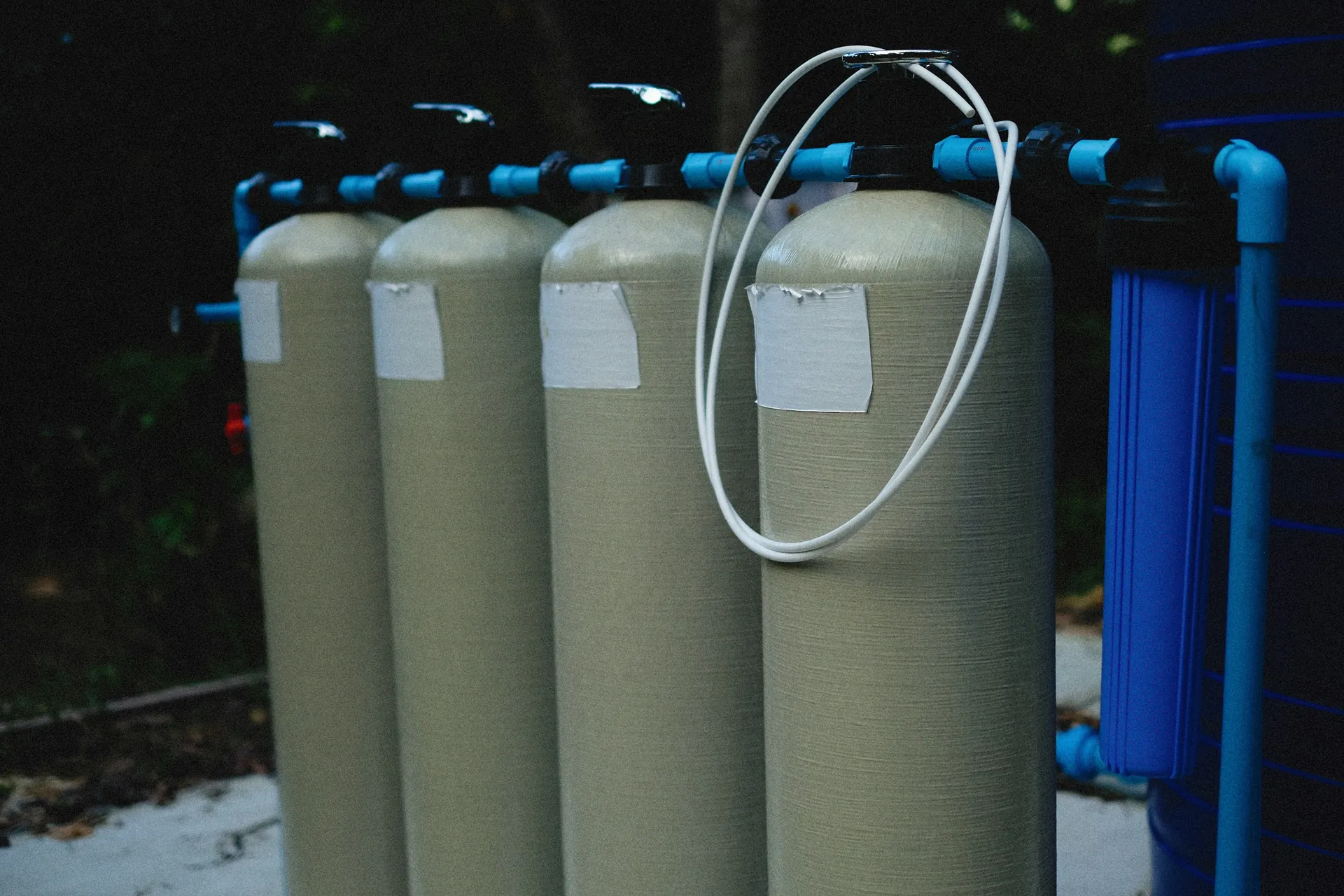 Row of pressure filter vessels on a water treatment skid