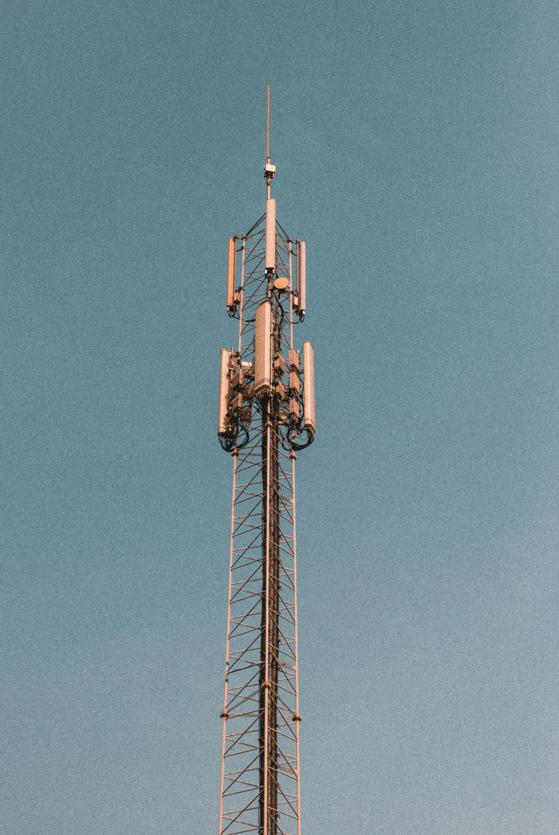 Radio and telecommunication tower against a clear sky